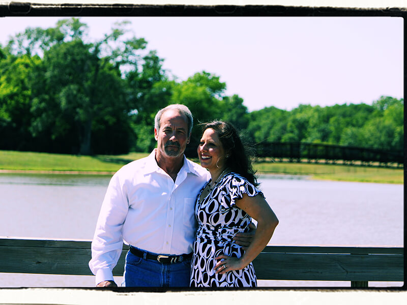 Marina and Her Husband Stood In front of Lake